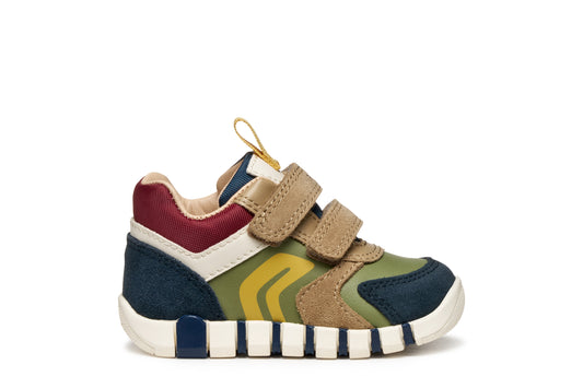 Multicolored children's shoe with velcro straps on a white background